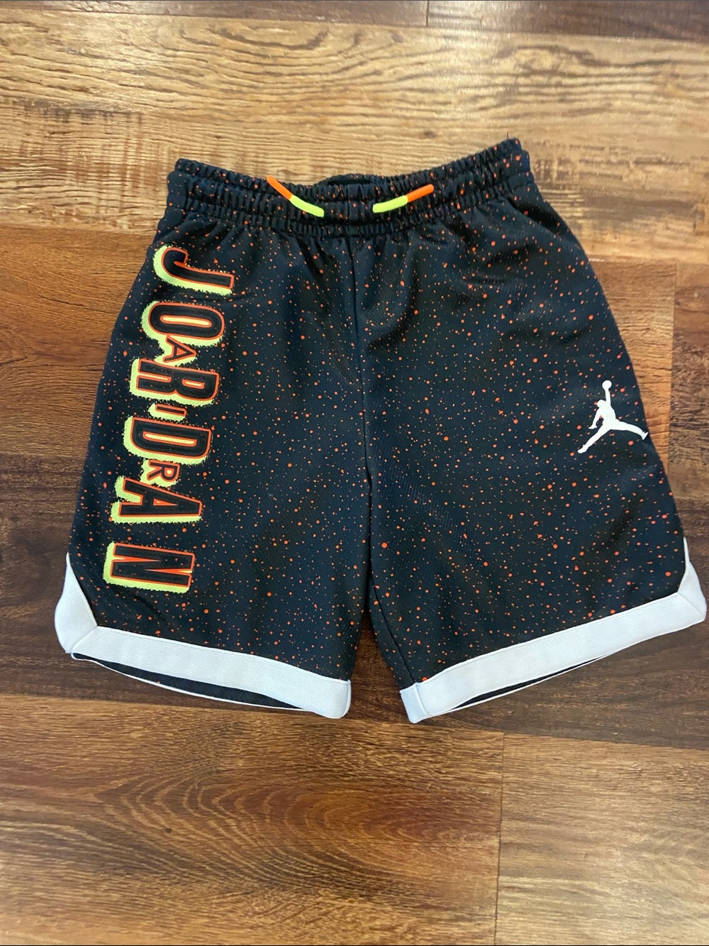 Jordan Black Shorts with Orange Speckle and White Trim